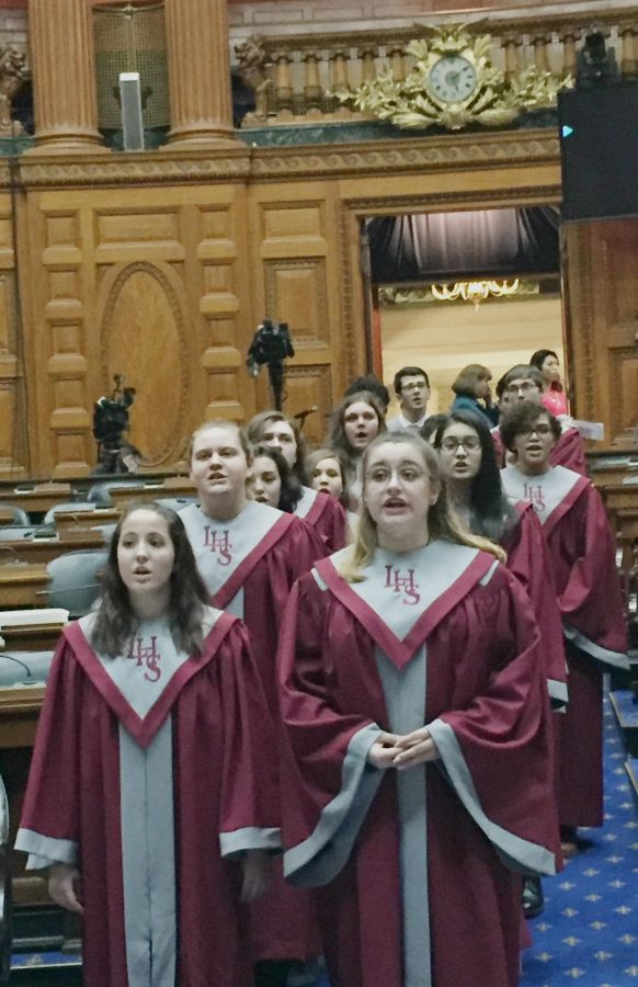 The LHS Chorus enter the State House chambers singing a warm up prior to the State of the State address in Boston.