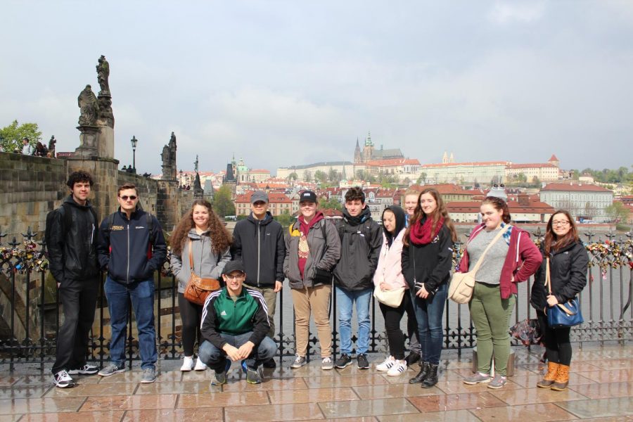 Students to the side of Charles Bridge in Prague, Czech Republic.