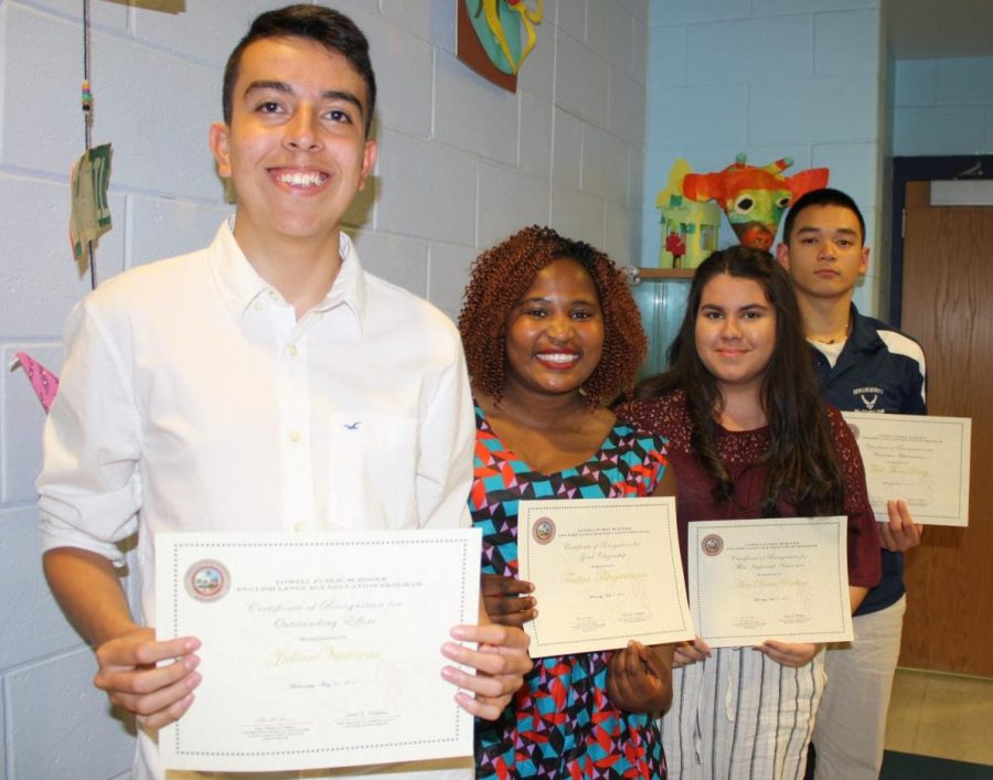 ELL students received awards for effort, citizenship, most improved student and academics at the Stoklosa School May 31, 2017.  Pictured in order of award from front are Julian Vivescas, Tantine Rebecca Bitegetsimana, Ana Dutra Pacheco and Tara Thorn Hong.
