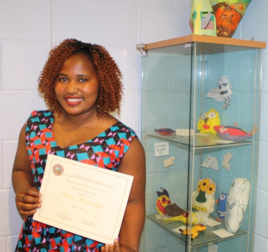 Tantine Rebecca Bitegetsimana received the award for citizenship at the Stoklosa School on May 31, 2017.