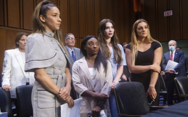 Gymnasts (from left to right) Aly Raisman, Simone Biles, McKayla Maroney and Maggie Nichols after testifying at a Senate Judiciary Committee hearing on the FBIs handling of the Larry Nassar investigation.
Saul Loeb/Pool via AP
